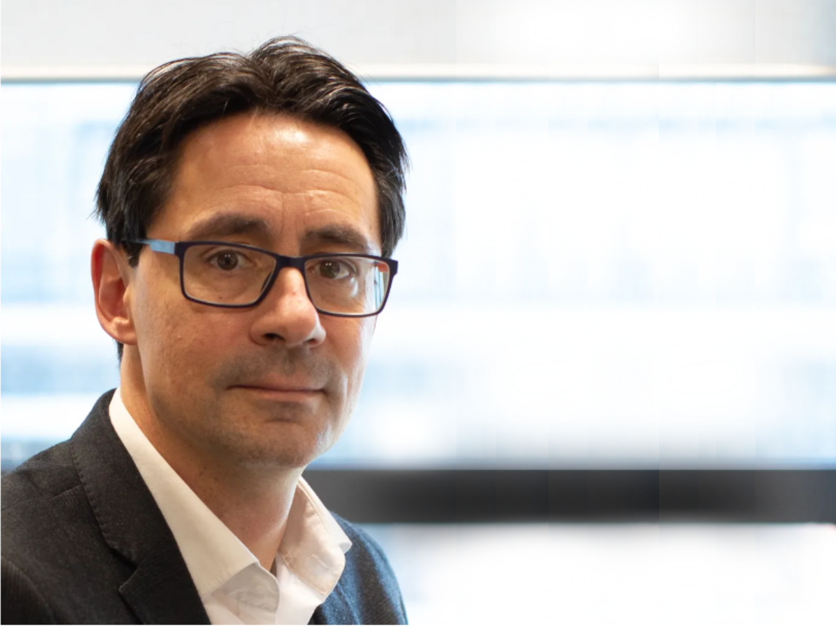 photo of Cedric Ghevaert in front of a window.