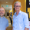 Photo of Bertie Gottgens and Matthias Zilbauer standing in front of the labs