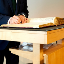 David Rowitch & Ben Simons sign the Charter Book 